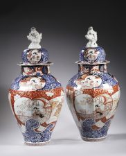 A pair of Imari jars and covers