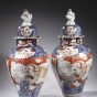 A pair of Imari jars and covers