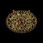 An oval pendant inset with rubies and diamonds North India 19th Century